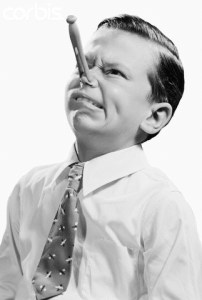 Boy with Clothespin On Nose